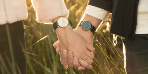 man and women wearing watches