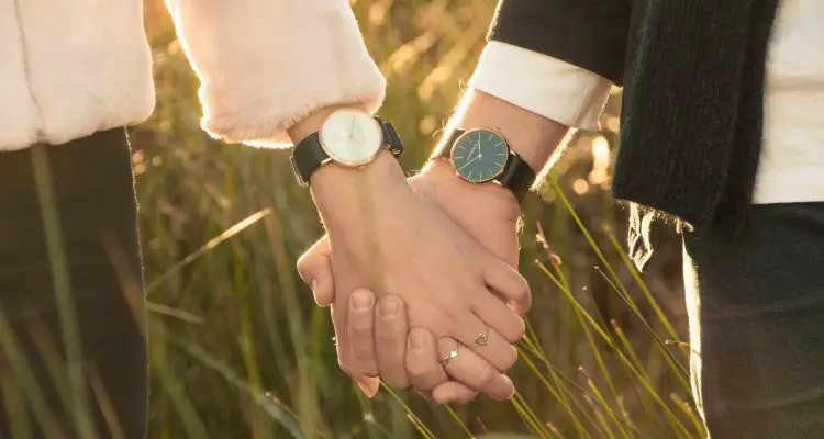 man and women wearing watches