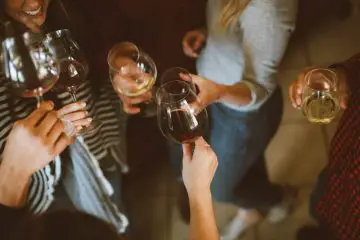 friends celebrating with wine