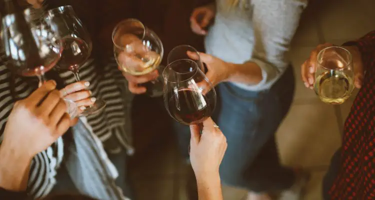 friends celebrating with wine